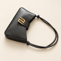 Black Shoulder Bag with Knotted Strap and Gold-Tone Detail